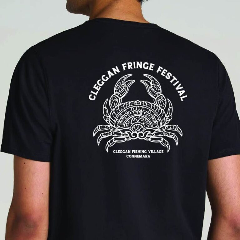 Man wearing a black shirt with a crab logo, "Cleggan Fringe Festival," and Clifden Bike Hire text.