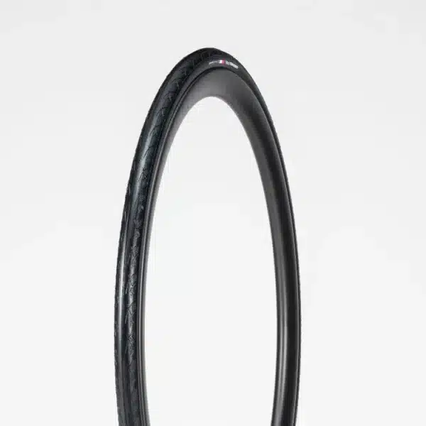 A single Tyre Bontrager AW1 Hard-Case Lite 700x25c stands upright on a white background.