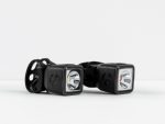 Two small, square black Bontrager Ion 100 R/Flare R City Bike Light Set on white background.