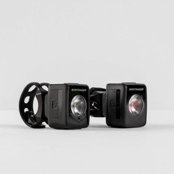 Two black 553855 bicycle lights with mounting straps on a plain white background.