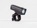 Bontrager Ion Pro RT Front Bike Light with handlebar mount, switched on against white background.