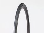 A black Bontrager R3 Hard-Case Lite TLR Road Tyre with smooth tread on a white background.