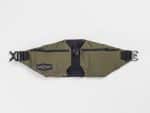 Bontrager Rapid Olive waist bag with black straps and two zip pockets, shown laid flat.