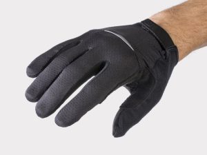 A close-up image of a person's right hand wearing a Bontrager Circuit Full Finger Cycling Glove. The glove appears textured for grip and has a small Velcro strap on the wrist for adjustment. The background is plain white.