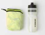 A folded yellow Bontrager Circuit Cycling Rain Jacket, XS, and a clear Trek water bottle side by side.