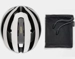 Trek Velocis Mips Road Bike Helmet (Medium) next to a black mesh drawstring bag.