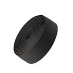 A roll of Bontrager Double Gel Cork Handlebar Tape Black coiled on a white background.