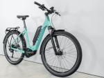 Allant+ 5 Lowstep Blue Sage e-bike with rear rack, black tyres, and frame battery.