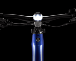 Dual Sport+ 2 Stagger: handlebars with headlamp, reflector, blue frame—ideal for Clifden Bike Hire.