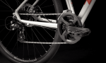 Close-up of a Dual Sport 1 Gen 4 drivetrain, showing the chain, pedals, and rear mech.