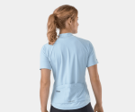 Woman in a Trek Solstice Women's Cycling Jersey, pockets visible, ready for Clifden Bike Hire.