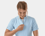 Smiling woman zips up a Trek Solstice Women's Cycling Jersey for Clifden Bike Hire.