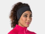 Woman in a pink jacket wearing a Bontrager Thermal Cycling Headband, looking to the side.